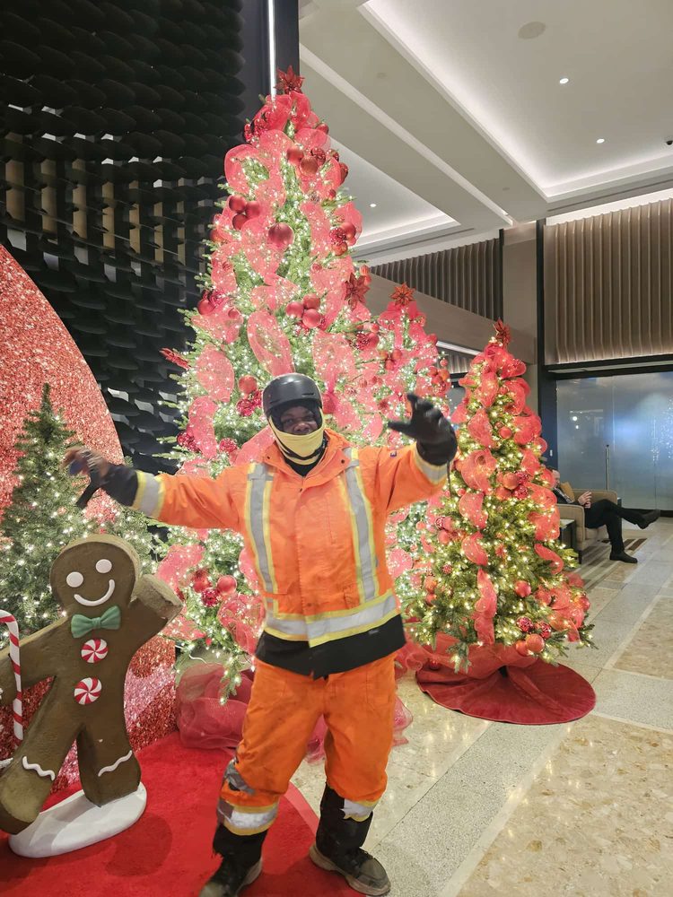 Rufus Paschal volunteering as Santa at Christmas